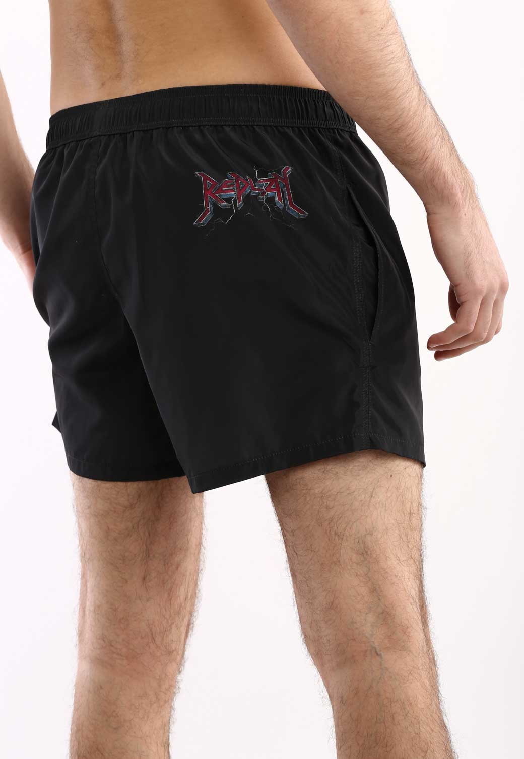 מכנסי ים לגברים בצבע שחור עם הדפס צבעוני - Image 3